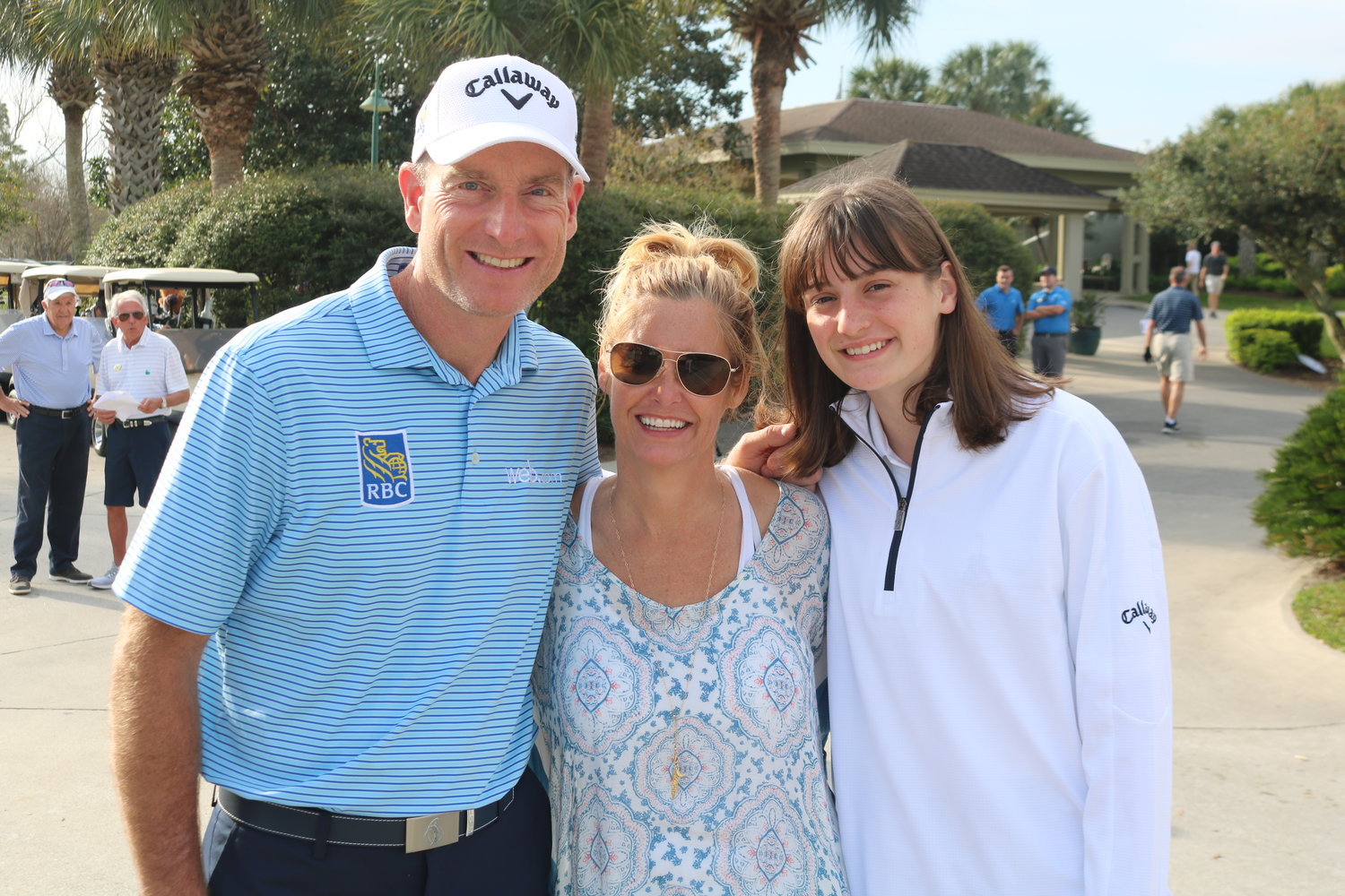 Jim, Tabitha and Caleigh Furyk gather at the Furyk Foundation golf tournament at Sawgrass Country Club on Monday, March 11.